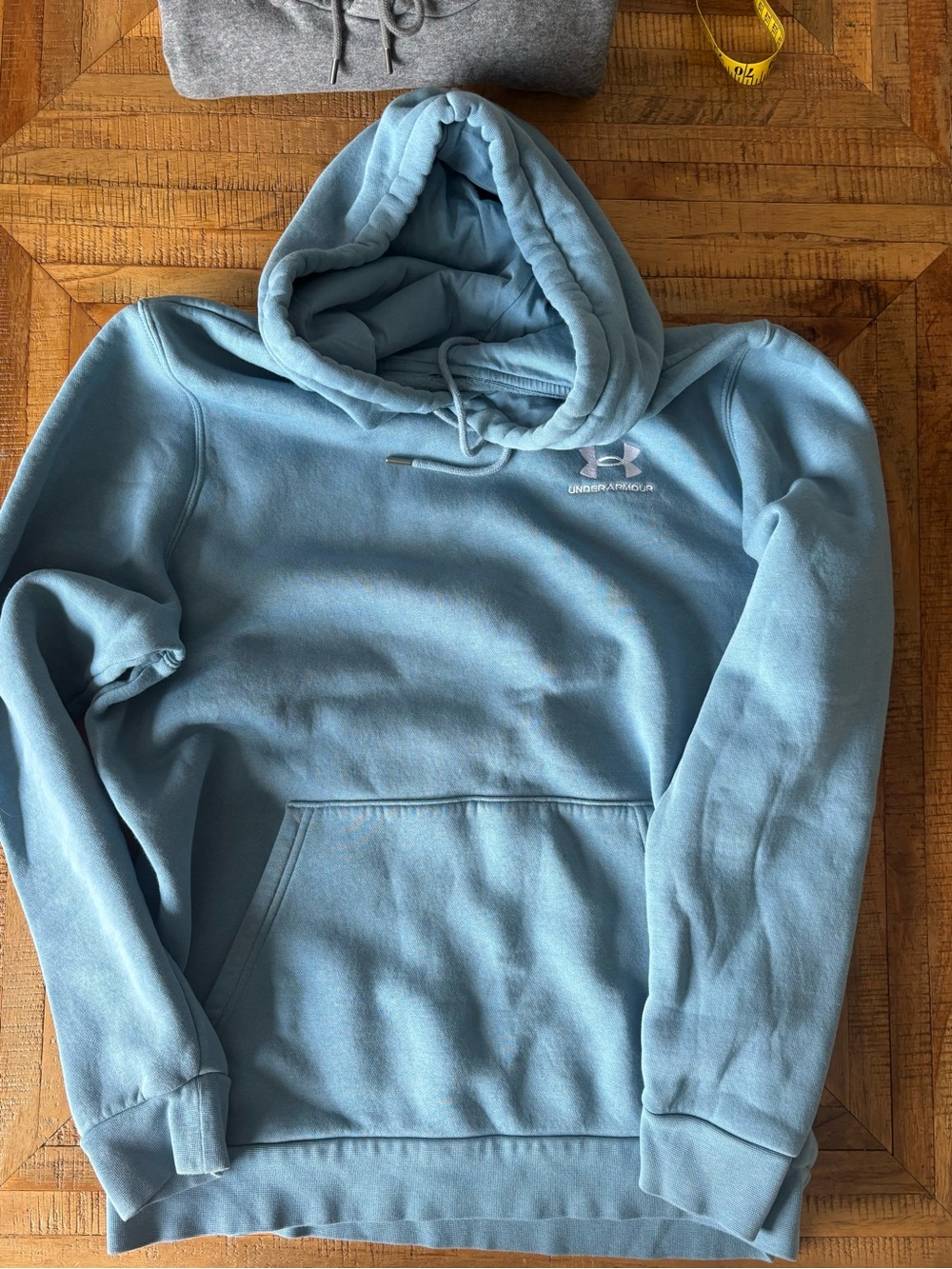 Two (2) Under Armour Men's Medium Hooded Sweatshirts one Gray and one Blue EUC